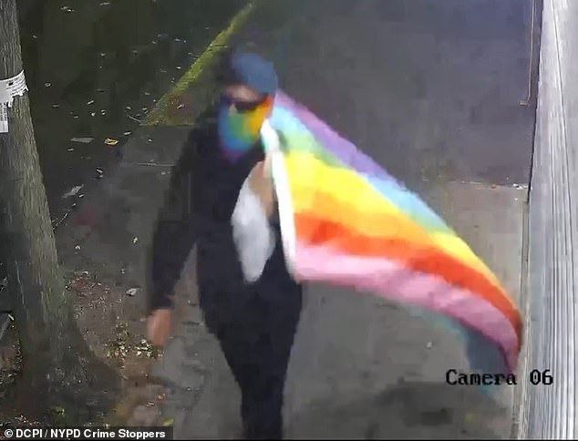 103830413-15284659-A_rainbow_flag_waving_man_is_wanted_for_vandalizing_churches_acr-a-38_1762981778742.jpg
