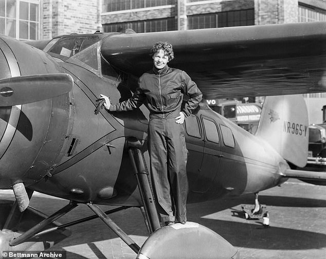 105317067-15442479-Amelia_Earhart_is_pictured_standing_on_one_of_her_planes_Nautico-a-12_1768096197108.jpg